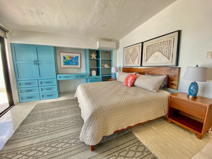 Sea facing bedroom with black out shades for great sleep 