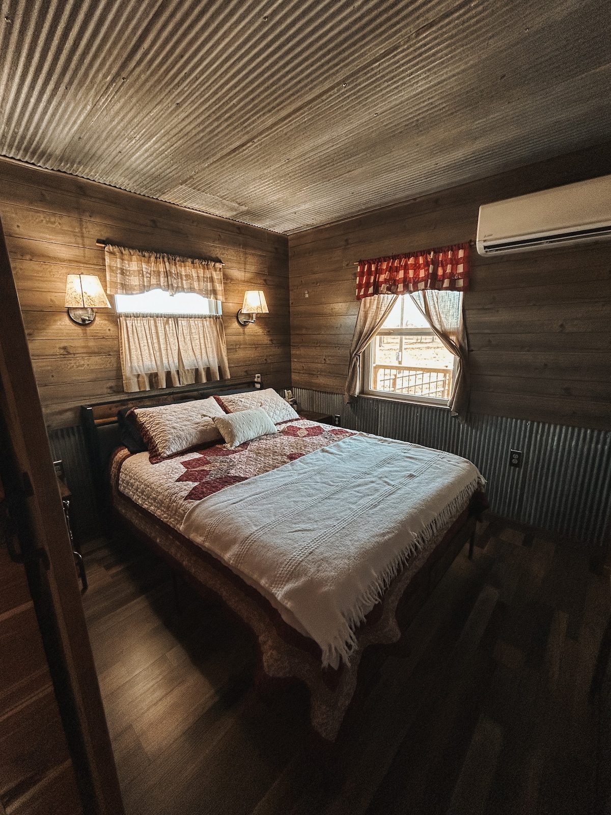 Queen sized bed perfect for relaxing into sleep after your adventures