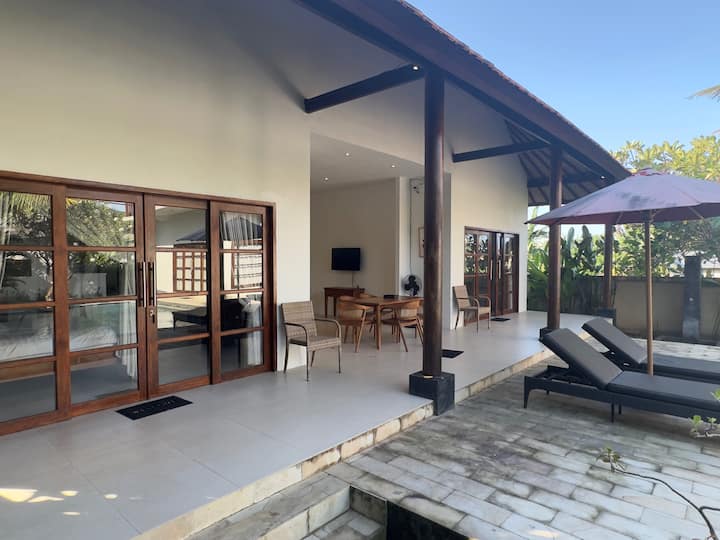 A spacious terrace enhances the airy and open atmosphere at Villa Light.