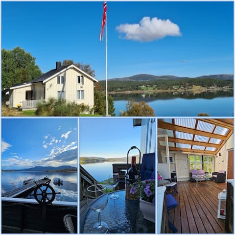 Cozy house by the sea with its own pier and boat.