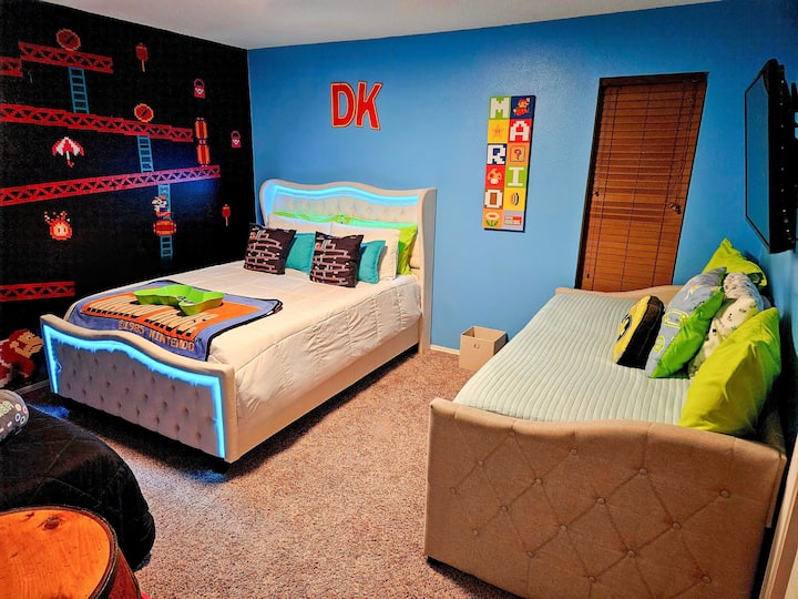 Guest Room #1 Queen Bed + 3 Twin Beds + Smart T.V.  + 1 Fast Charging 6 Port AI Towers