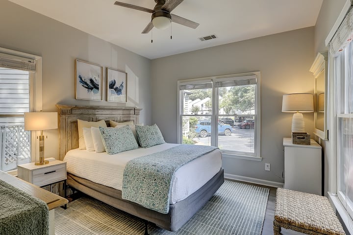 A calm, welcoming bedroom with a queen bed offers another cozy spot to settle in.