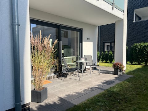 Top location! First floor apartment, modern, with garden