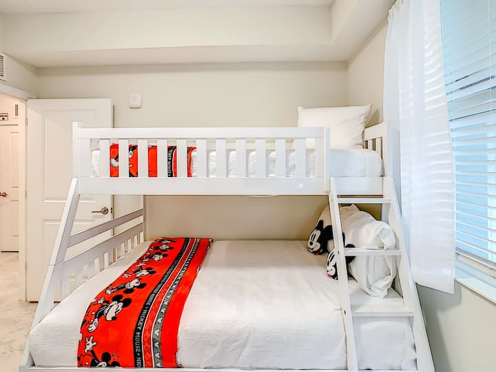 Mickey Mouse Themed Bedroom with Wooden Bunk Bed