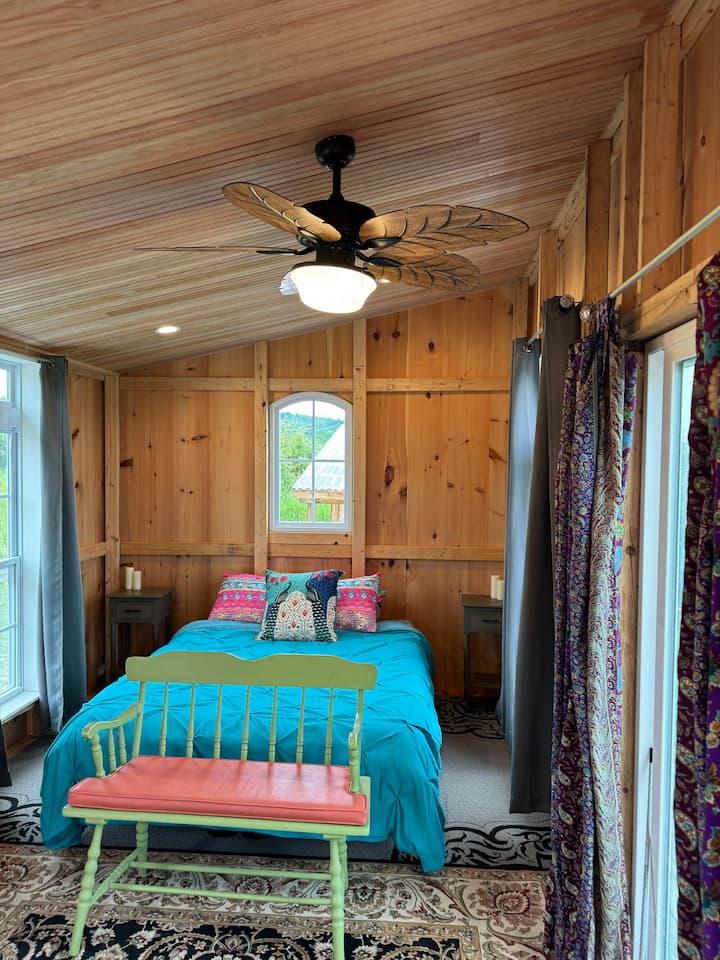 New Douglas Fir ceiling with insulation helps to keep the space cool in the daytime and warmer in the nighttime. 