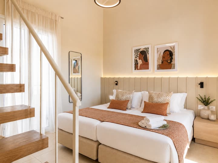 Villa 2 - First Floor - Bedroom 4 - Two single beds that can be arranged as a king-size bed, plus an attic level with an additional single bed and a private balcony