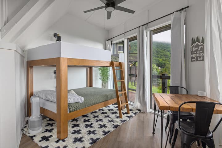 Full over full bunk beds. Each with a reading light! Ceiling fan and Dyson fan to keep you comfortable.