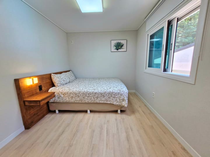 (Bedroom 3) This is a queen-sized bed.