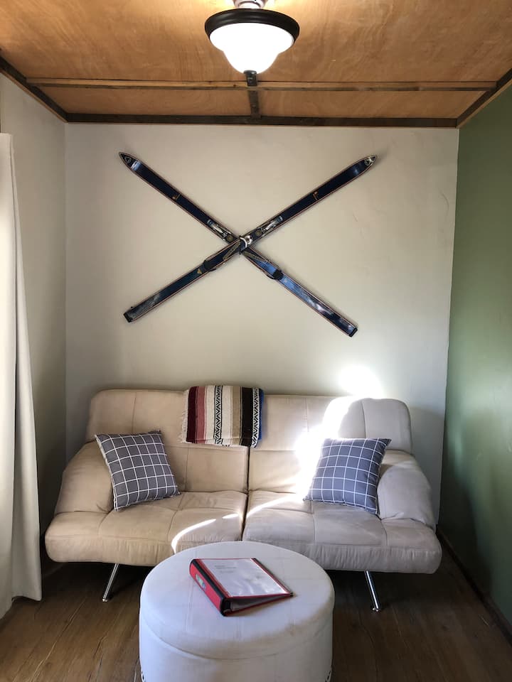 There is a set of extra sheets in the ottoman for the futon couch!