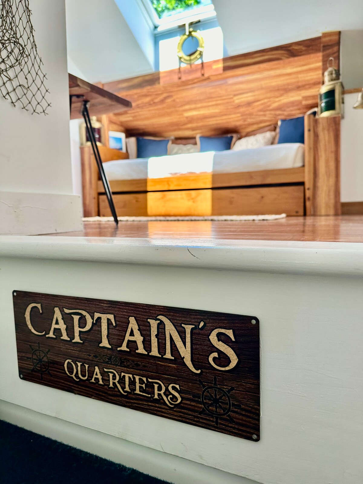 Cozy open loft-style space with stunning pond views, featuring a twin bed and trundle. Located just above Utopia's bedroom. Captains Quarter Open to the living room and therefore has no noise privacy in either direction
