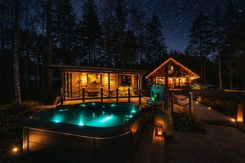 A lovely place with an outdoor hot tub and a yard sauna