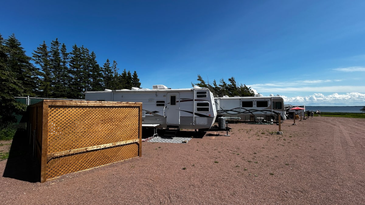 Oceanfront row of sites under a blue sky