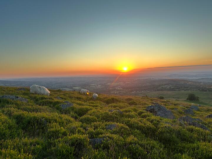 Scenic view of Clee Hills with sunset
