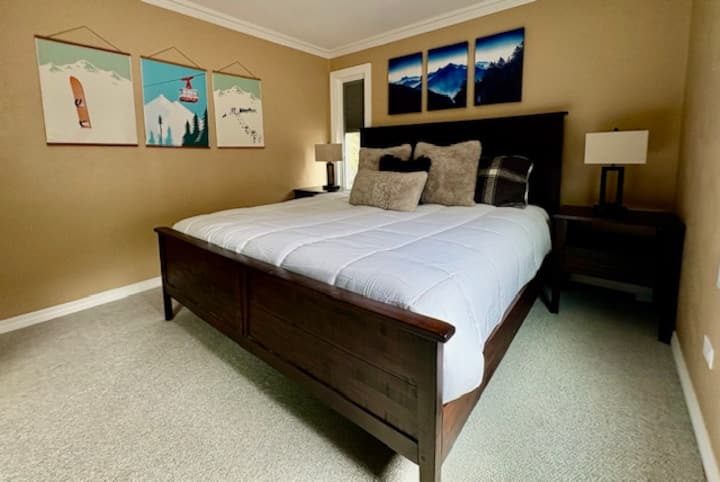 Comfy new king bed in the spacious sunny primary bedroom
