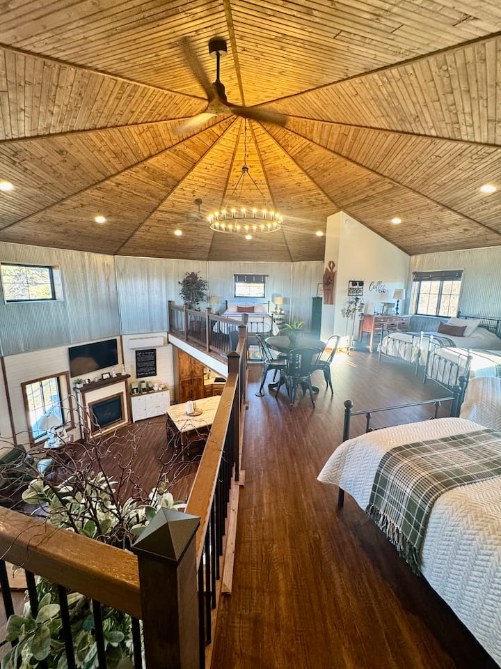 Second level sleeping area, coffee bar, and game table