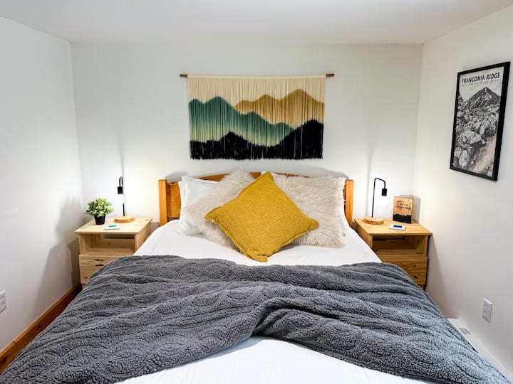 Drift off on a cozy queen bed with soft pillows and a lush duvet.  Watch a show on the smart TV or read by lamplight. Blackout blinds promise uninterrupted rest.