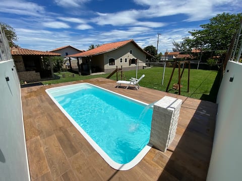 House with swimming pool, soccer field and gourmet area.