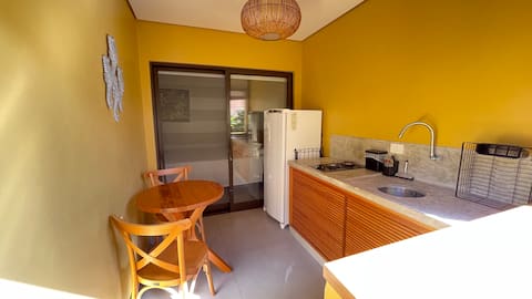 Top Airbnb: Ground-floor studio with 2 bedrooms, balcony, and private kitchen in Ilhabela