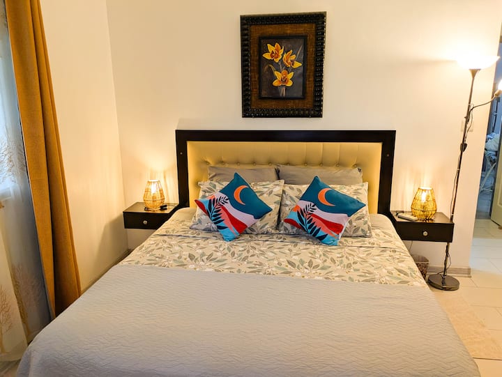 Our largest bedroom features a generous, luxurious bed designed to offer you maximum comfort throughout your stay.