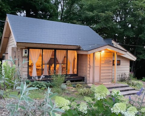 Limited to one group per day, Mökki is a small cottage with a garden by a stream