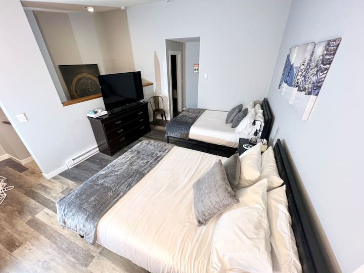 Bedroom 2: On the 2nd floor with two queen beds and 55 in TV with an Xbox and home arcade featuring two full size arcade machine featuring many classic games.