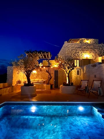 restored white house with swimming pool