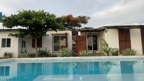 Two-bedroom house for four people with a pool