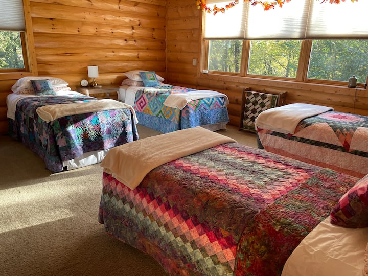 Spacious and easily accessible, this bedroom is on the main floor with no stairs and a connected bathroom.