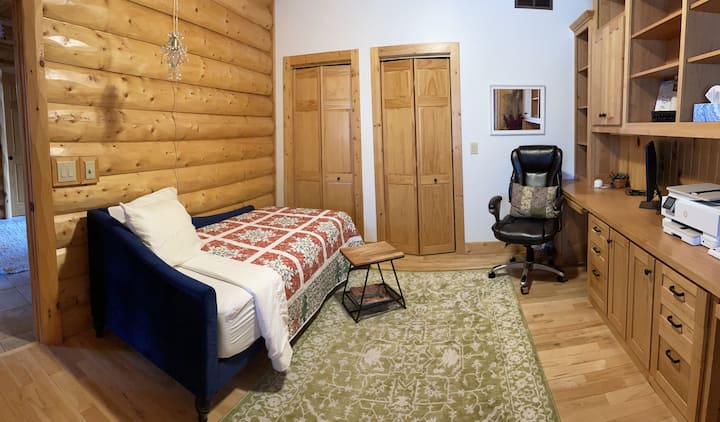 A private single with work space.  Perfect for that person who prefers to sleep alone or work late into the night.  Located on the main floor, accessible with no stairs.