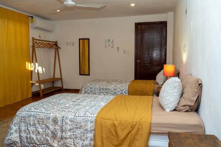 Room with two single beds. Overlooks the back garden 