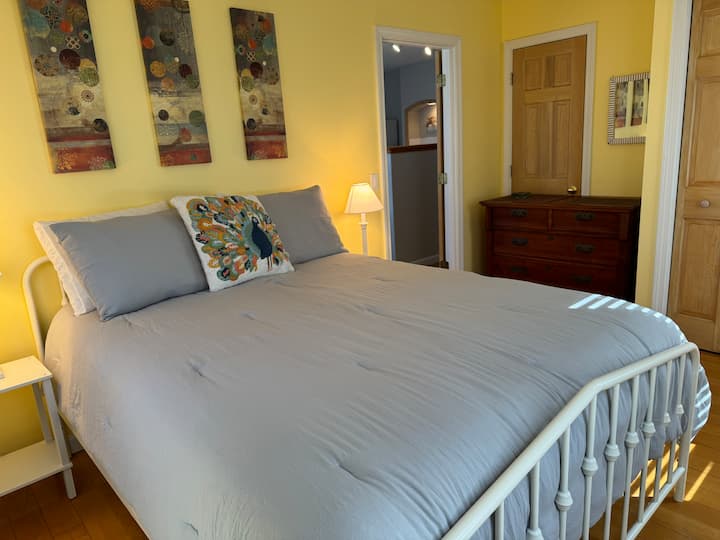 Queen bedroom located in the attached apartment. Air conditioning provided in the summer.