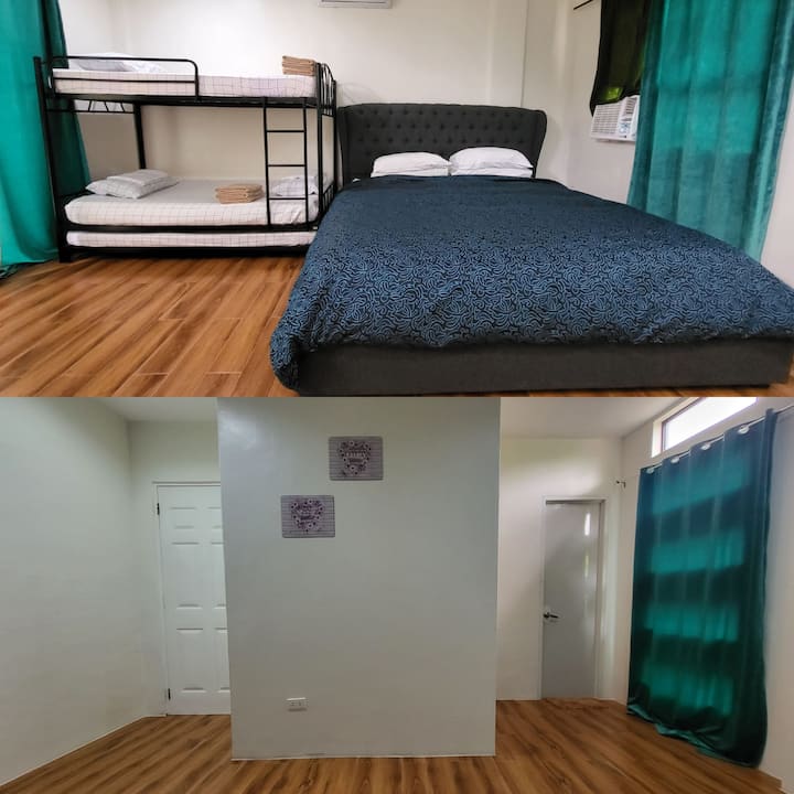 Masters bedroom
King sized bed and single (double decker bed) bed with pulled out 