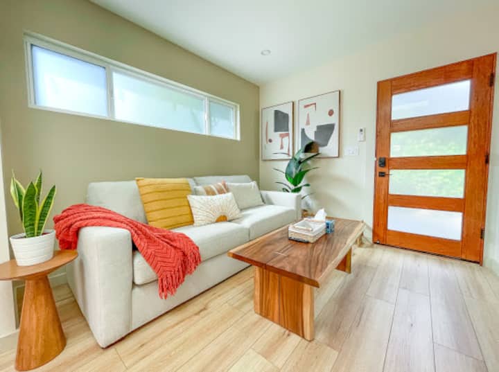 The couch is also a large pull out bed. We just added motorized shade for each window.
