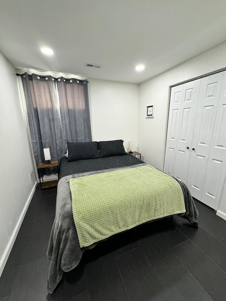Bedroom #4 with Queen Size bed, Smart TV, Dresser and Closet