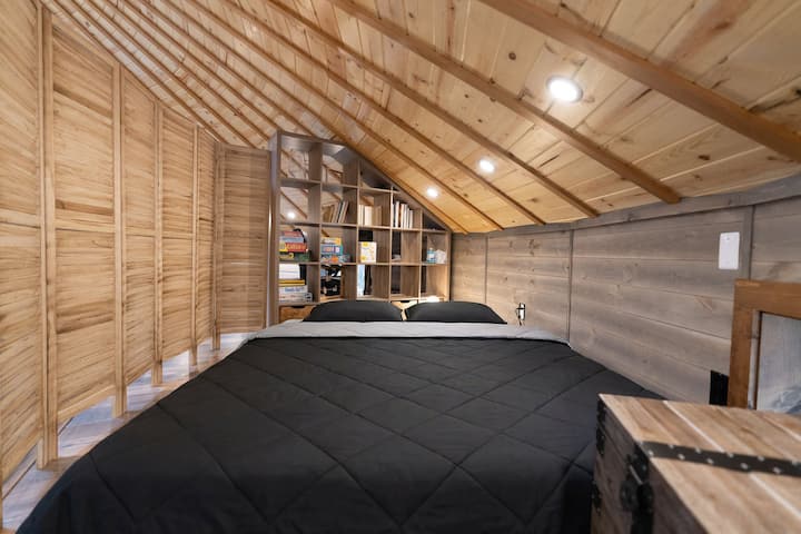 Floor sofa transformed into KING size bed with a privacy screen
