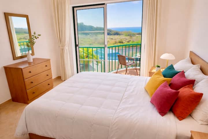 Double room with 2 beds (double bed), large closets and 2nd furnished balcony with ocean view