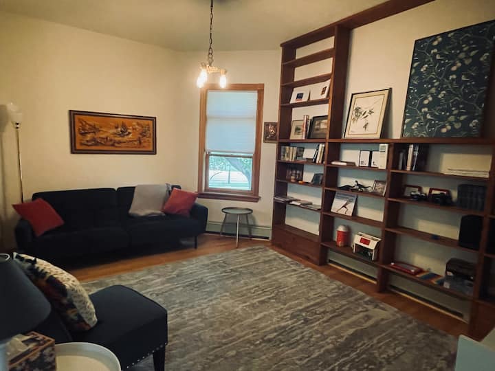 The den is a cozy spot to watch shows/movie on the TV or read and relax. It is open to the kitchen and dining room, but has a couch that can be used as a futon (extra bedding in a the East bedroom closet upstairs).