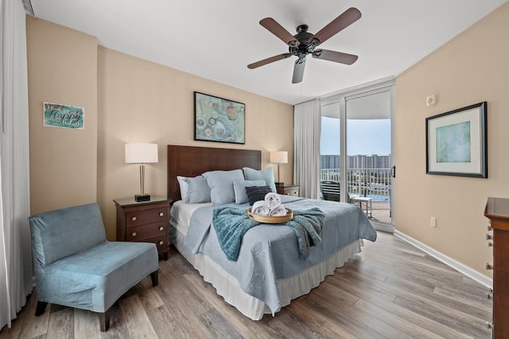 Spacious and beautifully decorated Master suite with Gulf and Lagoon pool views, patio access. Has its own private bathroom 