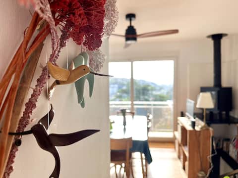 House overlooking the valley and sea in the distance