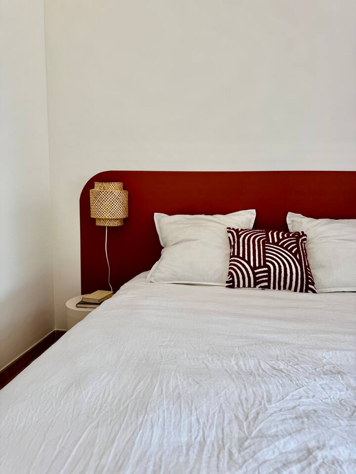 Bedroom 1 or red bedroom, is located on the ground floor and facing east. It opens directly to the East terrace. Bathroom 1 and a separate toilet are located right next to the bedroom.