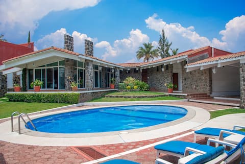 5BR retreat w/ heated pool, billiards + gardens