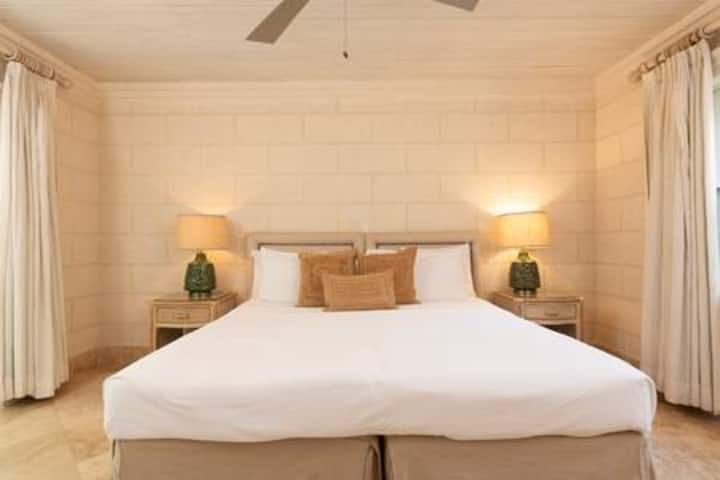 Perfectly proportioned twin or double en suite bedroom with ample clothes storage, ceiling fan and air conditioning.