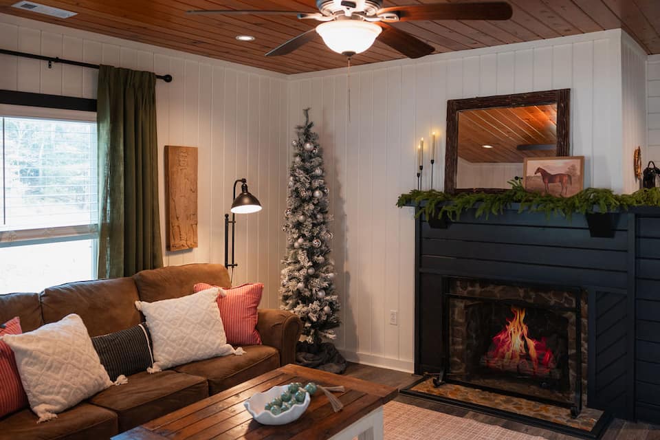 Settle in by the gas fireplace with the Christmas tree glowing and nothing on the schedule but a slow, cozy holiday