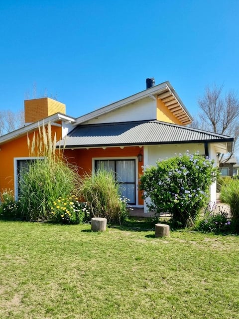 Popular Airbnb listing: Family home · court, pool, and outdoor fireplace, Los Reartes in Los Reartes