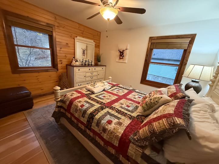 The third bedroom provides for a comfortable queen size bed with wonderful views out the two windows. The bedroom also has a large closet.