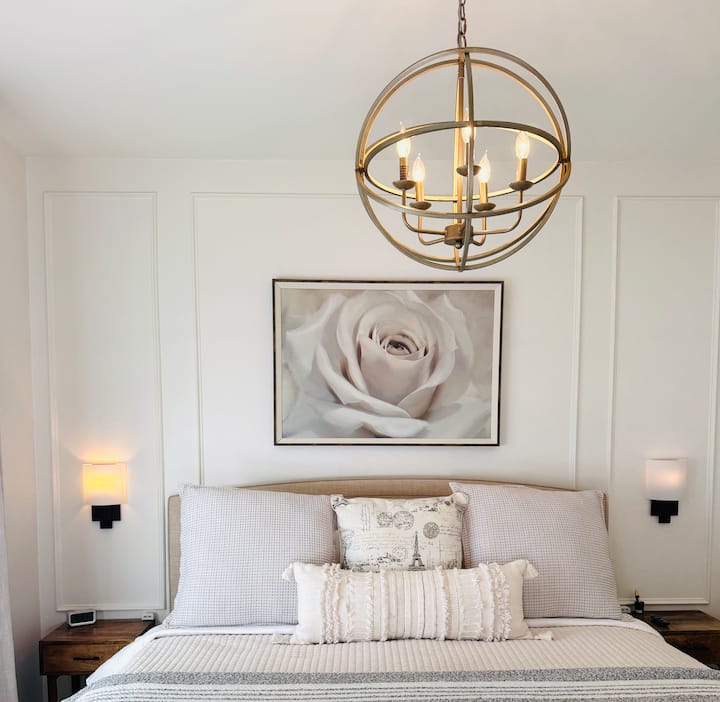 Bedroom is illuminated with chandelier and wall lights. King bed is very soft.  (Pillow top mattress with an extra memory foam topper!!) For those that enjoy an ultra plush experience. Not for firm bed sleepers. 