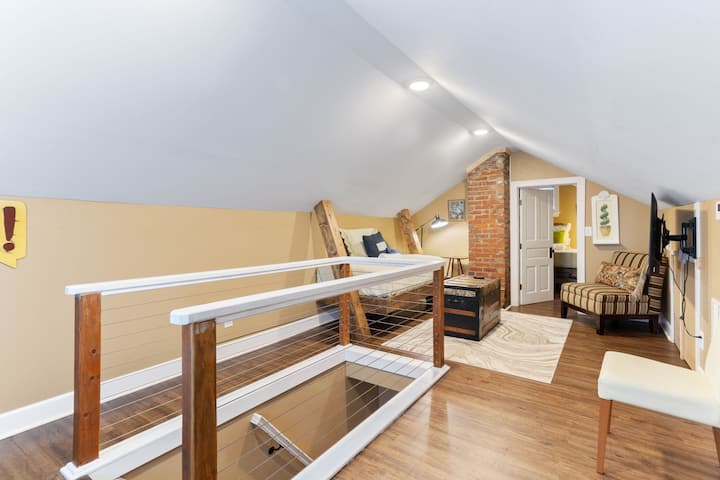 Attic bedroom with workspace at Hunsucker's Place is great for remote workers staying near UNCG Greensboro