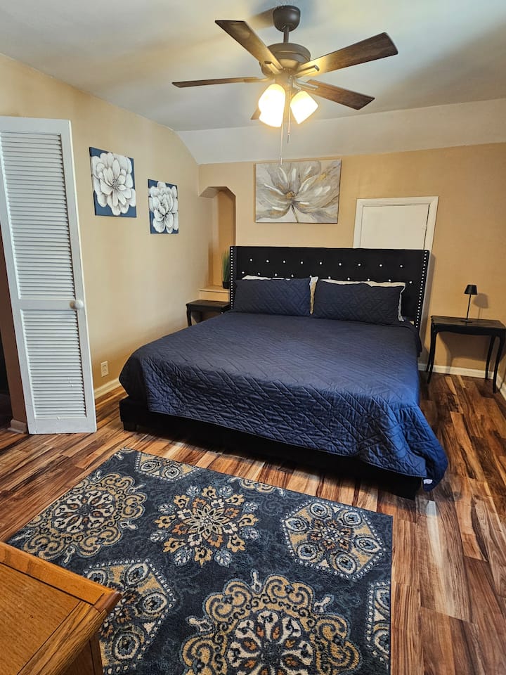 Master bedroom(located on second floor) king-size bed, with two night stands, computer desk, dresser and closet.
