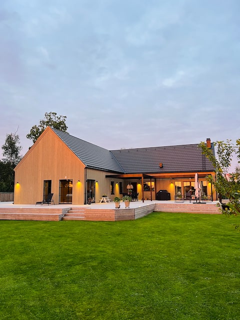 Modern barn with large terrace & garden near lake