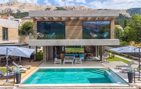 Beach front home in Baska with sauna